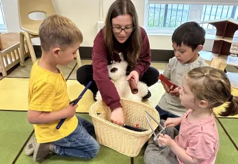 Preschool aged children and teacher at an Early Learning Center