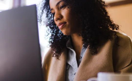 Woman working on a laptop