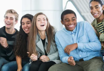 Teens having fun interacting with one another.