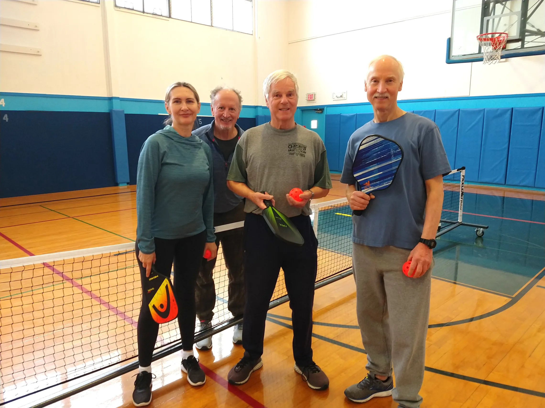 YMCA members playing pickleball.