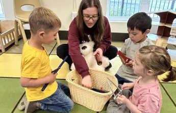 Preschool aged children and teacher at an Early Learning Center