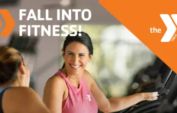Two women talking while working at out the Y