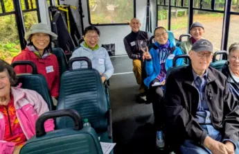 Group of people on a bus going on an adventure.