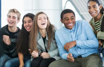 Teens having fun interacting with one another.