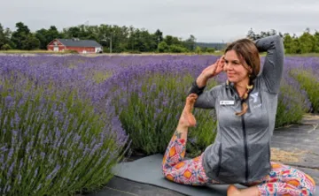Woman doing yoga in a lavender field