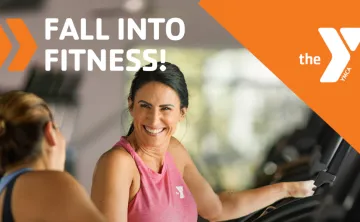 Two women talking while working at out the Y