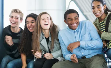 Teens having fun interacting with one another.